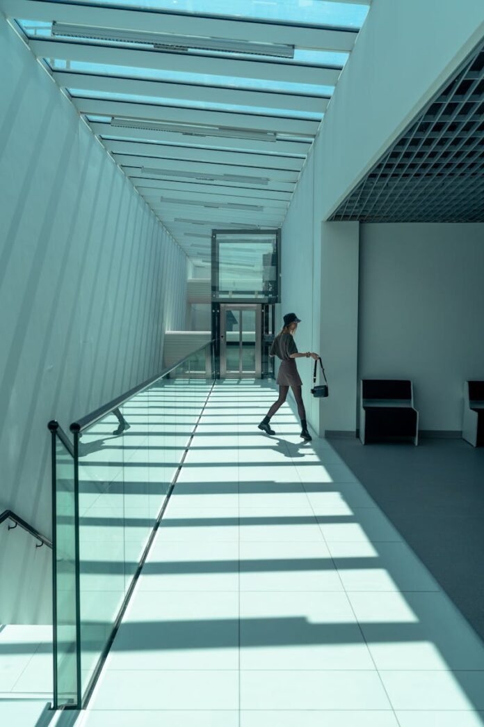 Woman on Glass Floor in an Office