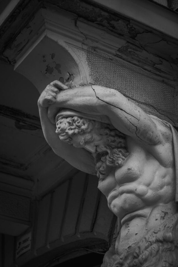 Detailed black and white photo of architectural sculpture in Radom, showcasing artistic craftsmanship.